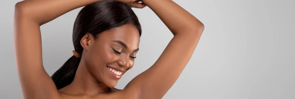 Woman happy after receiving treatment for hyperhidrosis