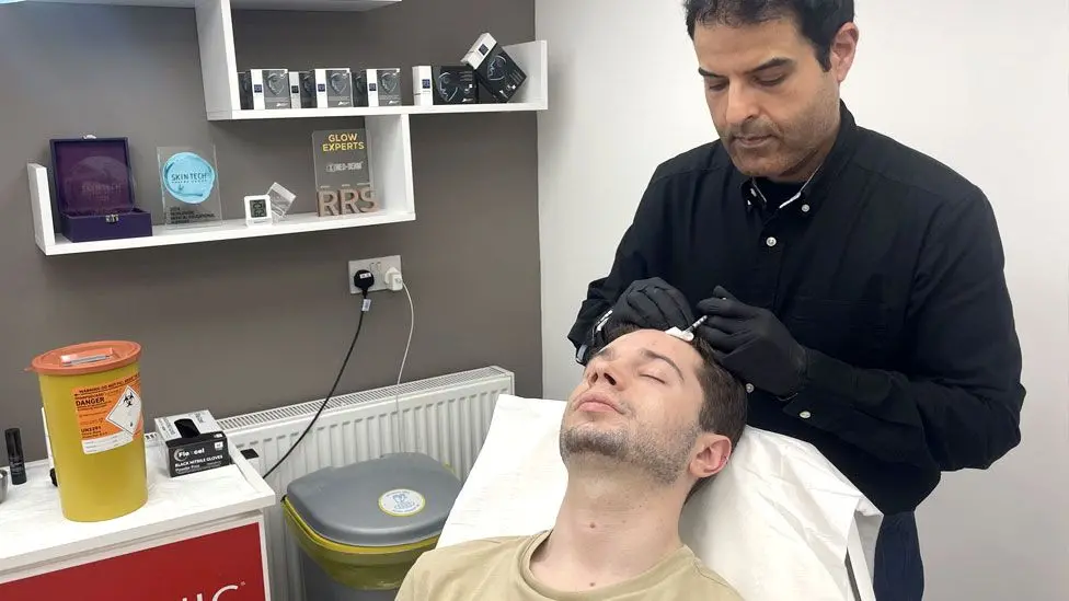 An image of Dr Javed Hussain administering botox to prevent ageing skin as part of the young persons prevention plan offered at Neo-Derm.